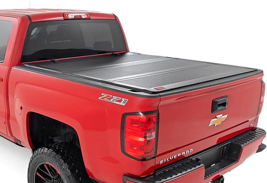 Rough Country Hard Tri-Fold Flip Up Truck Bed Tonneau Cover for Chevy Silverado and GMC Sierra 1500/2500HD/3500HD (2014-2019) - Fits 5'9 Bed with Rail Caps