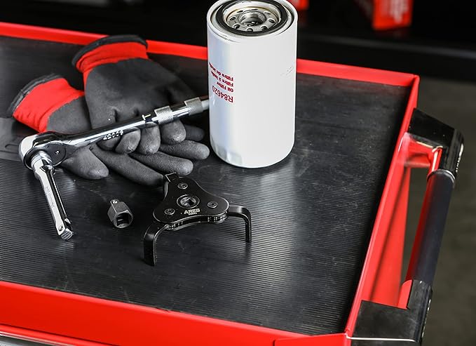 ARES 56041 – Adjustable 3-Jaw Oil Filter Wrench – 2 1/2-Inch to 4 Inch (63mm to 101mm) Capacity – Use with 3/8 or 1/2-Inch Drive Ratchets or 7/8-Inch Wrenches – Carbon Steel Construction