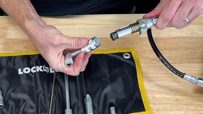 LockNLube 8-Piece Quick Connect Greasing Accessory Kit. Complete grease fitting connection kit. Reach any grease fitting on any machine. The rip-stop case keeps tools clean and portable.